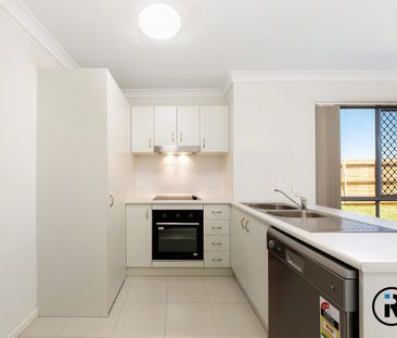 MUST SEE, NEAR NEW 3 BEDROOM FAMILY HOME! - Photo 3