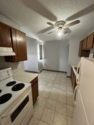 AURORA APARTMENTS - 104 - Photo 1