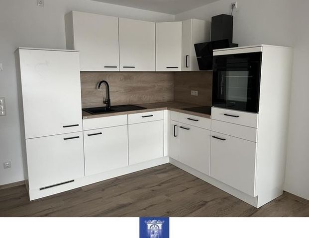 Perfekt sanierte 2-Zimmerwohnung mit optimalen Zuschnitt und Balkon im Erstbezug! - Foto 1