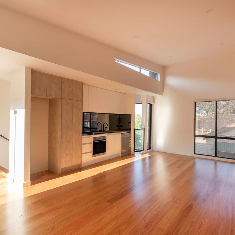 Architectural Townhouse In Brunswick Awaits - Photo 1