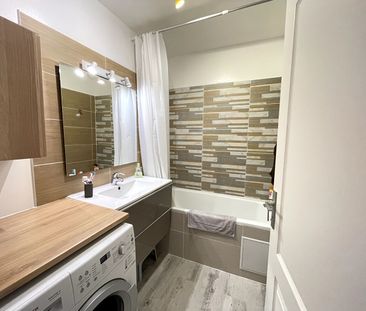 Appartement T2 avec terrasse et stationnement - Photo 3