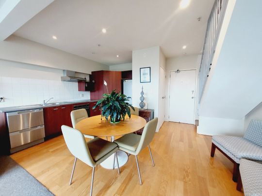 Light-Filled Two-Bedroom Apartment with Stunning Views & Unbeatable Location - Photo 1