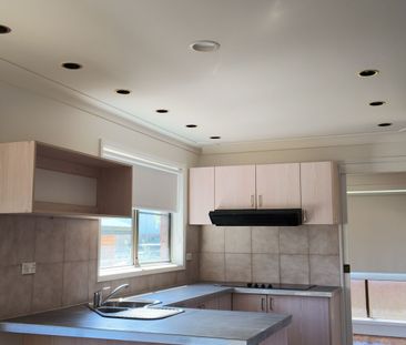 Family Home in Convenient Killarney Vale Location - Photo 3