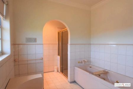 “Spacious Family Living with Dual Kitchens and Versatile Lower Level” - Photo 3