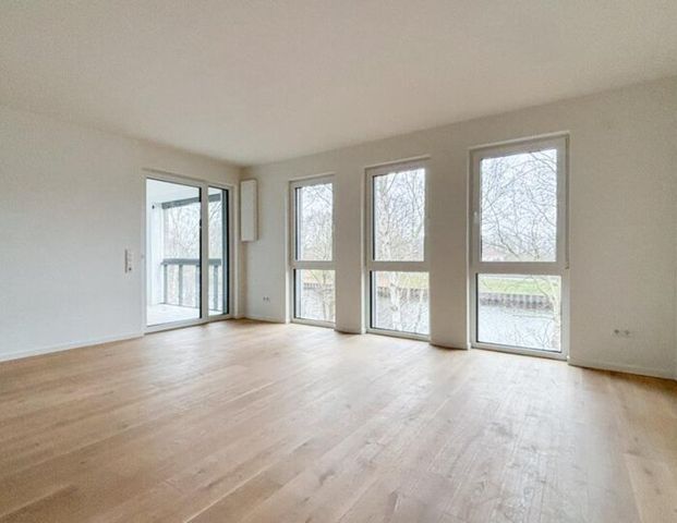 Hochwertige 4-Zimmer-Wohnung mit traumhaftem Blick auf den Küstenkanal - Photo 1