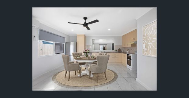 Charming family home with two sheds in Bucasia - Photo 1