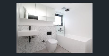 Modern 4-Bedroom Townhouse - Photo 3