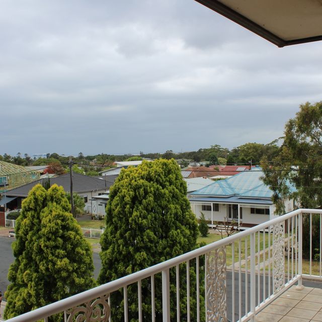 TOP FLOOR APARTMENT WITH OCEAN VIEWS - Photo 1