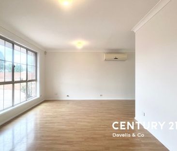 Comfortable Family Living in a Convenient Location - Photo 1