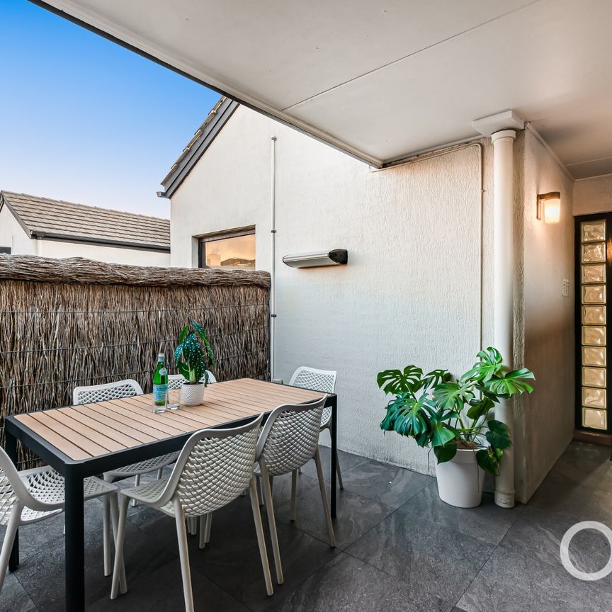 Open the Door to Beachside Elegance with Sweeping Views - Photo 1