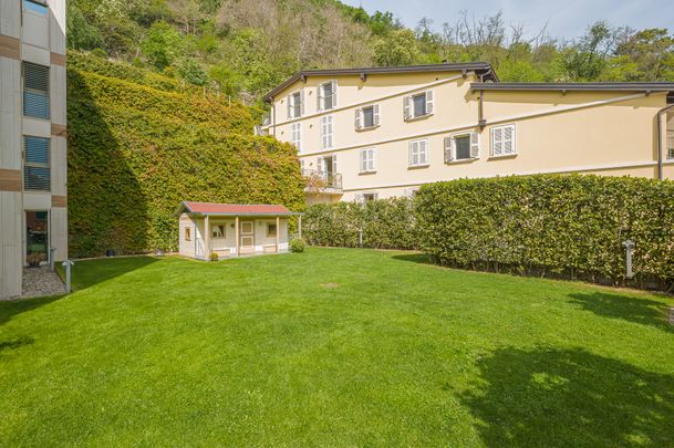 CONFORTEVOLE APPARTAMENTO CON GIARDINO PRIVATO A MELIDE - Foto 1