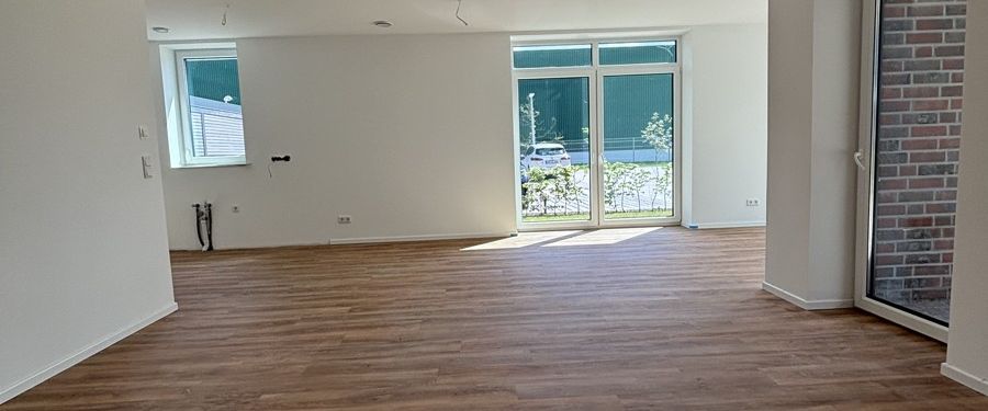 Sonnige Erdgeschosswohnung am Norder Tor mit großer Terrasse zur Miete! - Foto 1