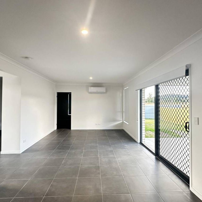 This stunning 18 Month home is available for rent! - Photo 1