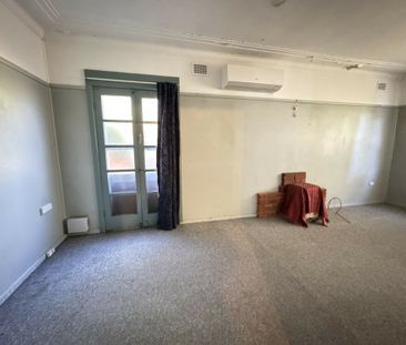 Spacious 2-Bedroom Home with Sunroom & Large Backyard � Prime Locat... - Photo 4