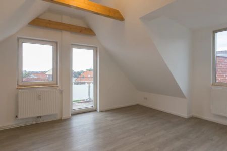 Helle Dachgeschosswohnung mit fantastischem Schleiblick vom Sonnenbalkon - Foto 3