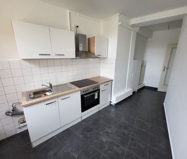 Ihre 3-Zi.-Wohnung mit NEUER Einbauküche und Potential im Herzen de... - Photo 3