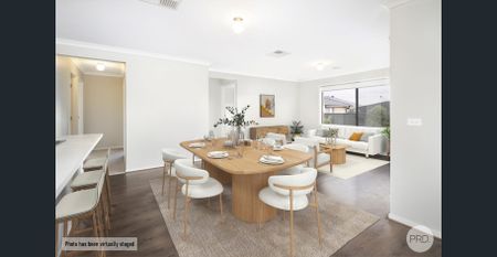 GENEROUSLY SIZED FAMILY HOME WITH DUAL LIVING ZONES & STUDY - Photo 2