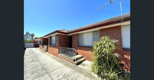Two-Bedroom Unit - Photo 1