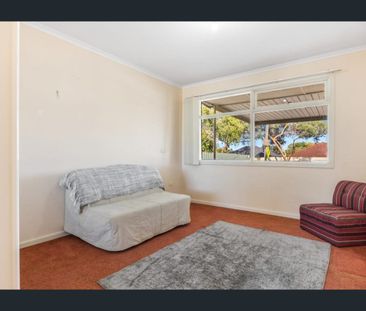 Well-Located Family Home with Space & Convenience - Photo 1