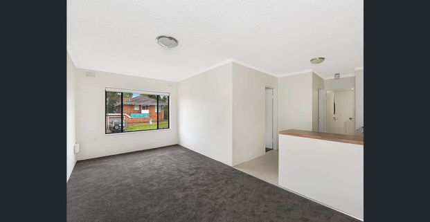 Conveniently Positioned for Easy Living - Photo 1