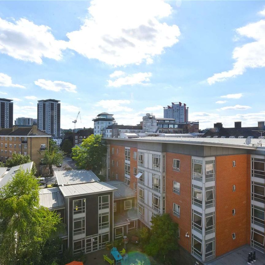 A bright two bedroom two bathroom apartment with direct access to a private balcony - Photo 1