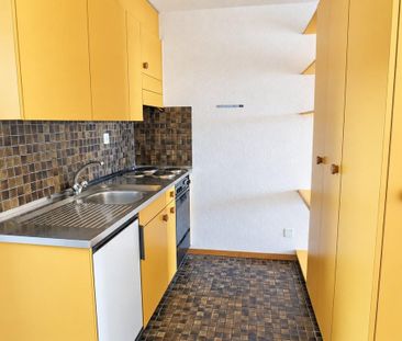 Charmante 2.5-Zimmer-Dachwohnung mit Aussicht auf Langenthal - Foto 2