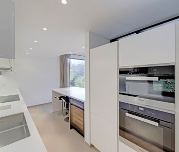 ELEGANTE APPARTAMENTO DI 4.5 LOCALI CON GIARDINO E VISTA LAGO - Photo 3