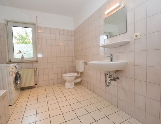 Dachgeschoswohnung mit Garage in ruhiger Siedlungslage in Markhausen - Foto 1