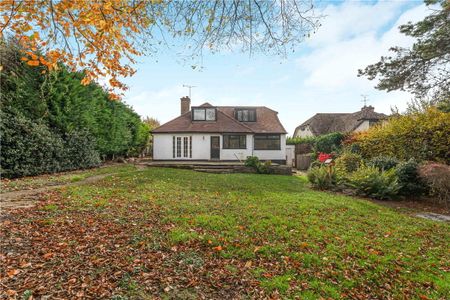 Pine Cottage is a detached family home in Chalfont St Giles, with a garage, ample driveway parking and a well established rear garden. - Photo 2