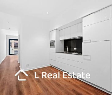 Modern 2 Bedroom Apartment in the Heart of Melbourne CBD - Photo 5