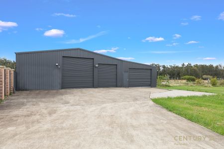 Large Modern Family Home with Pool and Large Sheds - Photo 5