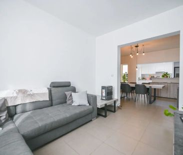 Gelijkvloerse woning met uitweg achteraan in Wielsbeke - Photo 2