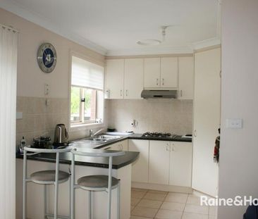 Conveniently Postioned Townhouse - Photo 1