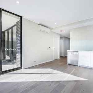 Modern two bedroom unit - 20% below market rent - Photo 2