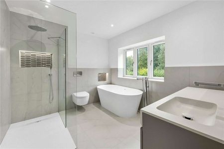 Beautifully finished new-build home just 0.5 miles from Walton-On-Thames Station. This five bedroom family residence combines contemporary design and cutting-edge technology. - Photo 2