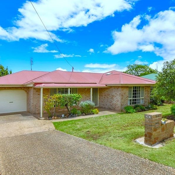 Attractive, Low-set Brick Home in Convenient Location - Photo 1