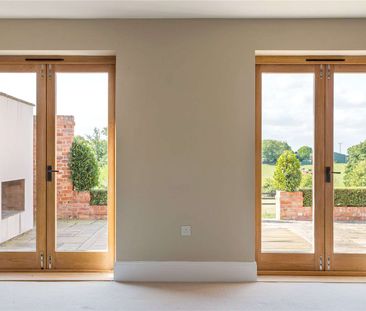 An exquisite four bedroom, four bathroom barn conversion with South... - Photo 1