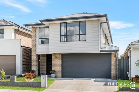 Ultra-Modern Family Home in the Heart of Marsden Park - Photo 4