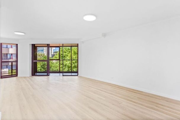 Stylish Renovated Apartment with Wrap-Around Balcony - Photo 1