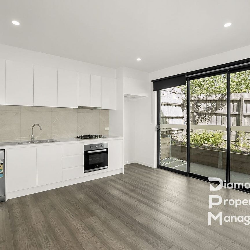 Luxurious Townhouse Living with Cutting-Edge Features - Photo 1