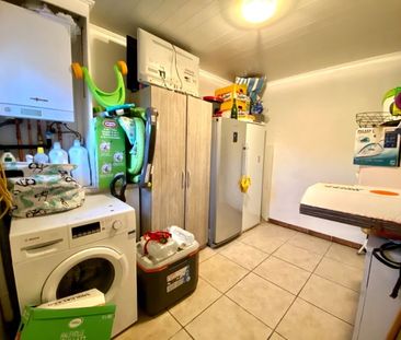 GELIJKVLOERSAPPARTEMENT MET TWEE SLAAPKAMERS EN GARAGE - Photo 5