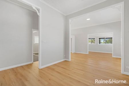 Beautifully Renovated 4 Bedroom Home in Prime Location complete with partial water views! - Photo 4