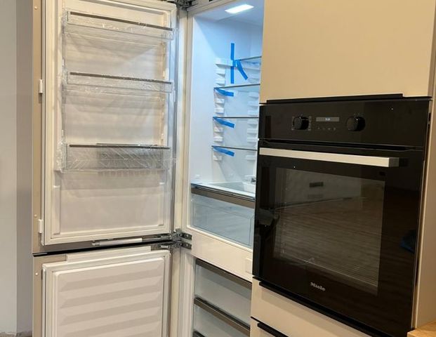 Ihr Rückzugsort: Wohnung mit Garten und hochwertiger Ausstattung - Foto 1