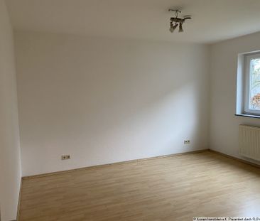 3-Zimmer-Erdgeschosswohnung mit eigenem Garten und Tiefgaragenstell... - Foto 3