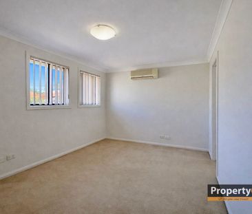 *Modern 2-Bedroom, 3-Bathroom Townhouse in Prime Location* - Photo 3