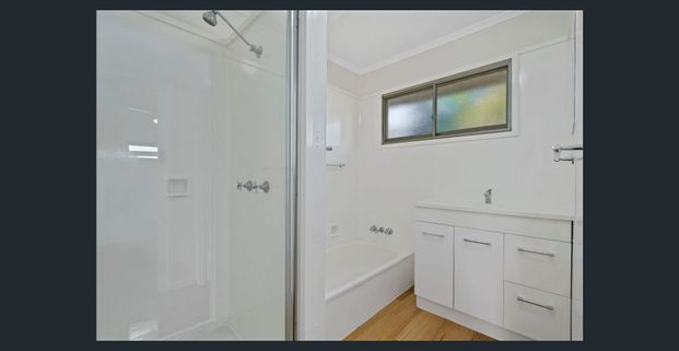 AIR-CONDITIONING... FULLY FENCED... DISHWASHER... RENOVATED... PLENTY OF STORAGE... - Photo 1