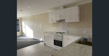 Updated unit, close to town! - Photo 5