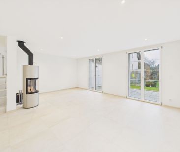 Modern 5.5-room terraced house with practical floor plan, village - Photo 1