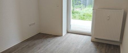 Erstbezug... 2 Raum Wohnung mit Terrasse und Einbauküche... - Foto 1