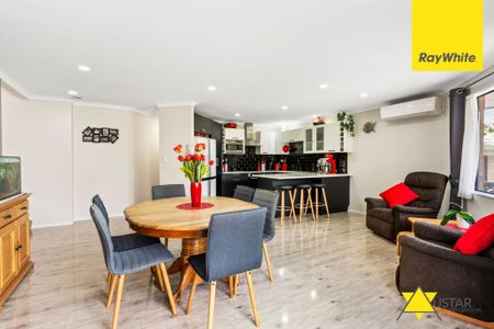 A beautifully finished four-bedroom home is perfect for a professional family! - Photo 2